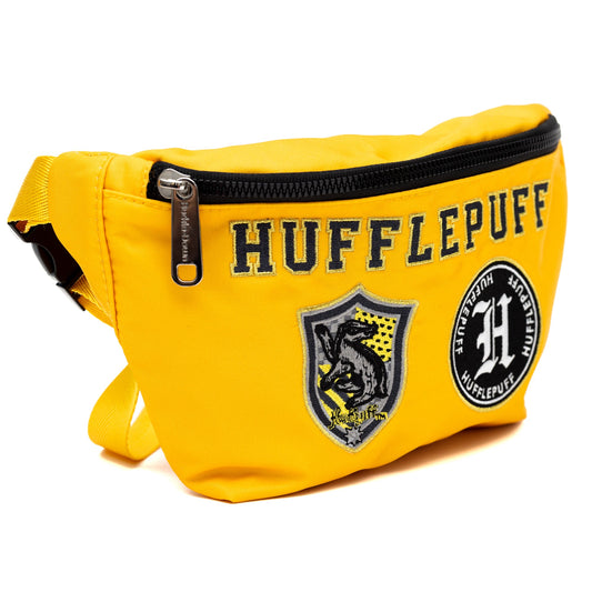 Detailed view of the Hufflepuff crest embroidery on the premium yellow canvas bag.