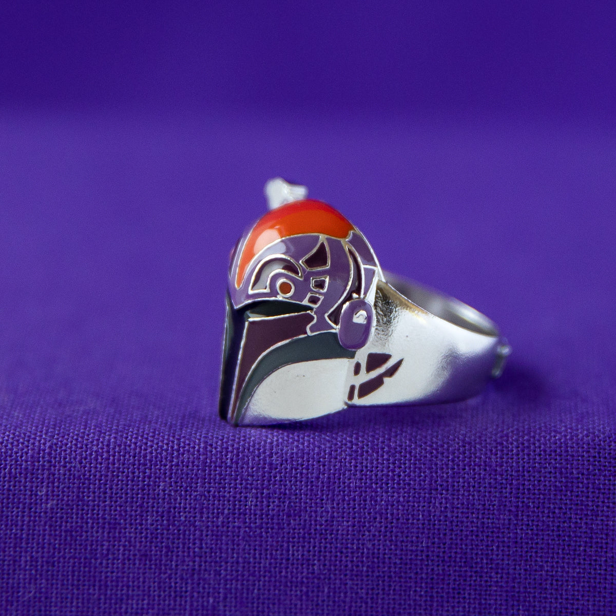 The Star Wars x RockLove Sabine Wren Ring on a finger for scale.