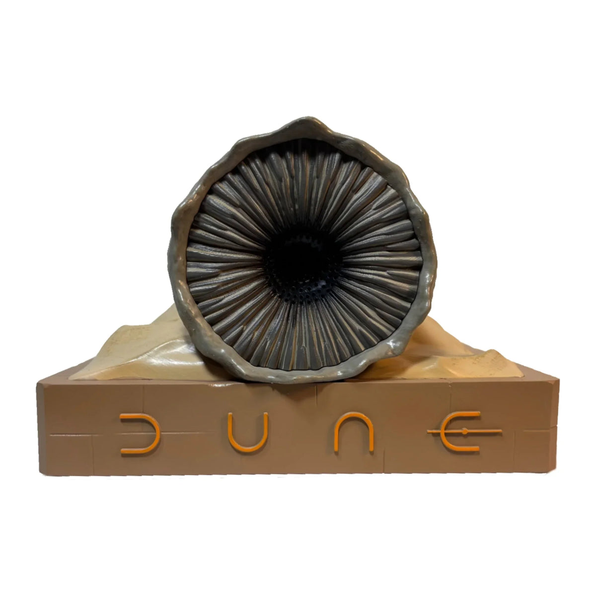 Close-up of the manufacturer plaque and serial detail on the bottom of the speaker base