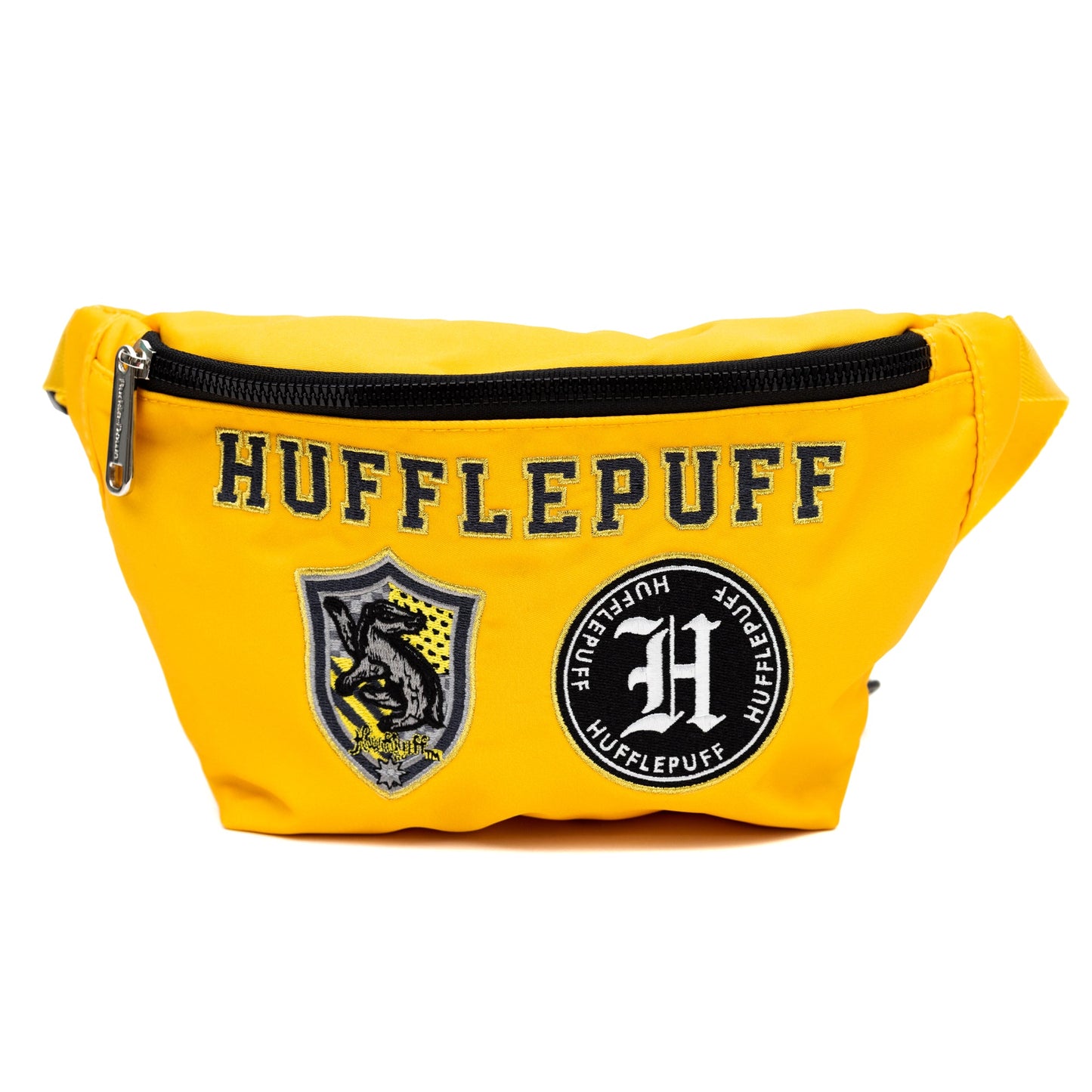 Front view of the yellow Harry Potter Hufflepuff fanny pack featuring embroidered patches.