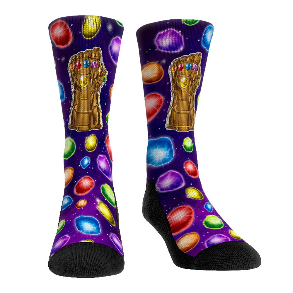 Folded pair of Rock 'Em Socks featuring an all-over colorful Marvel Infinity Stones graphic pattern