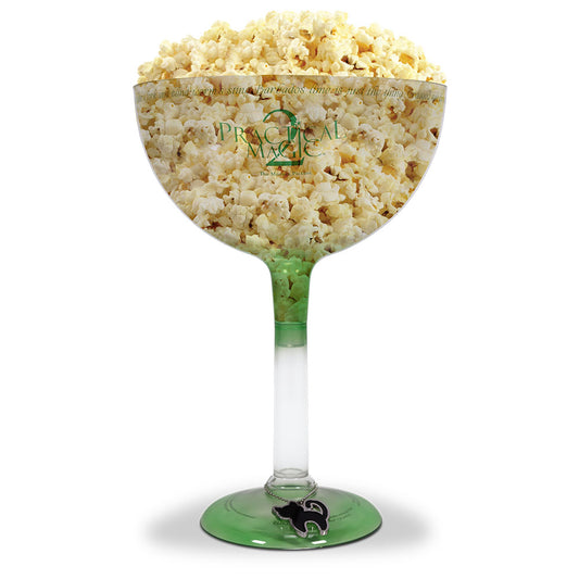 Practical Magic 2 Margarita Glass Popcorn Bucket held up against a movie screen.