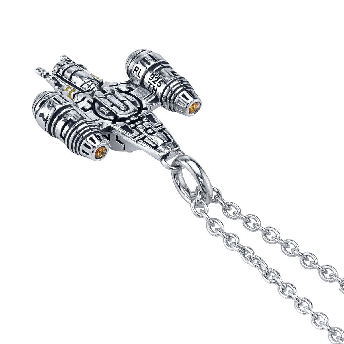 Close-up of the Razor Crest pendant showing yellow enamel and amber crystals