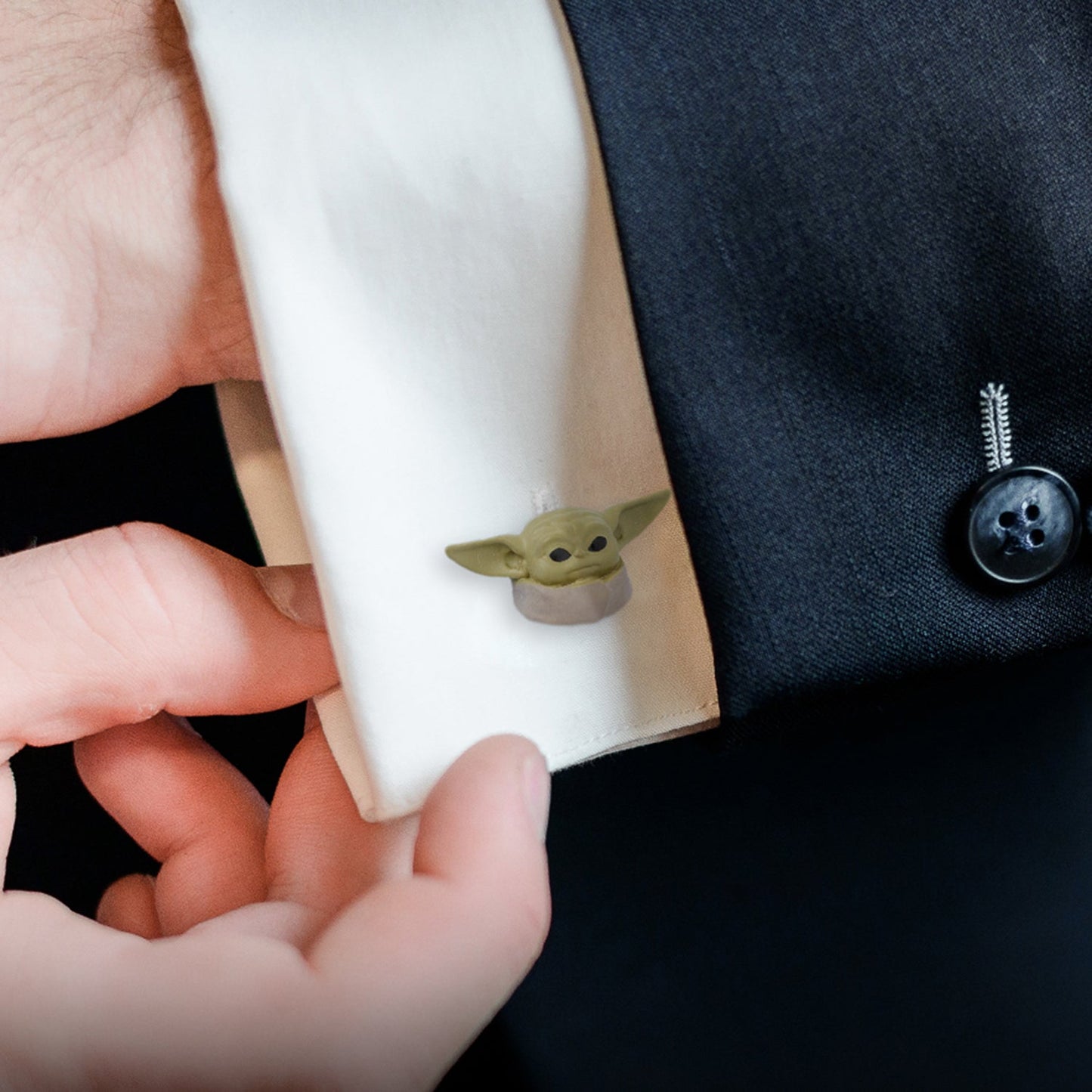 A pair of Grogu 3D cufflinks set against a neutral background for a full product view.