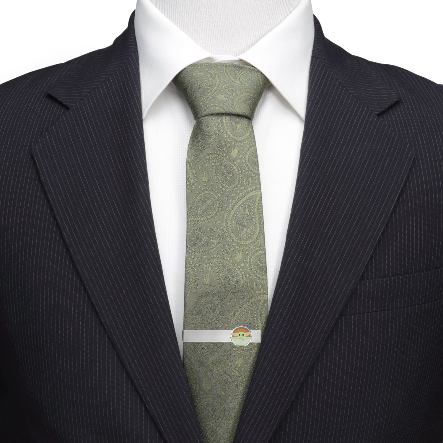 Polished metal Grogu tie bar on a blue necktie