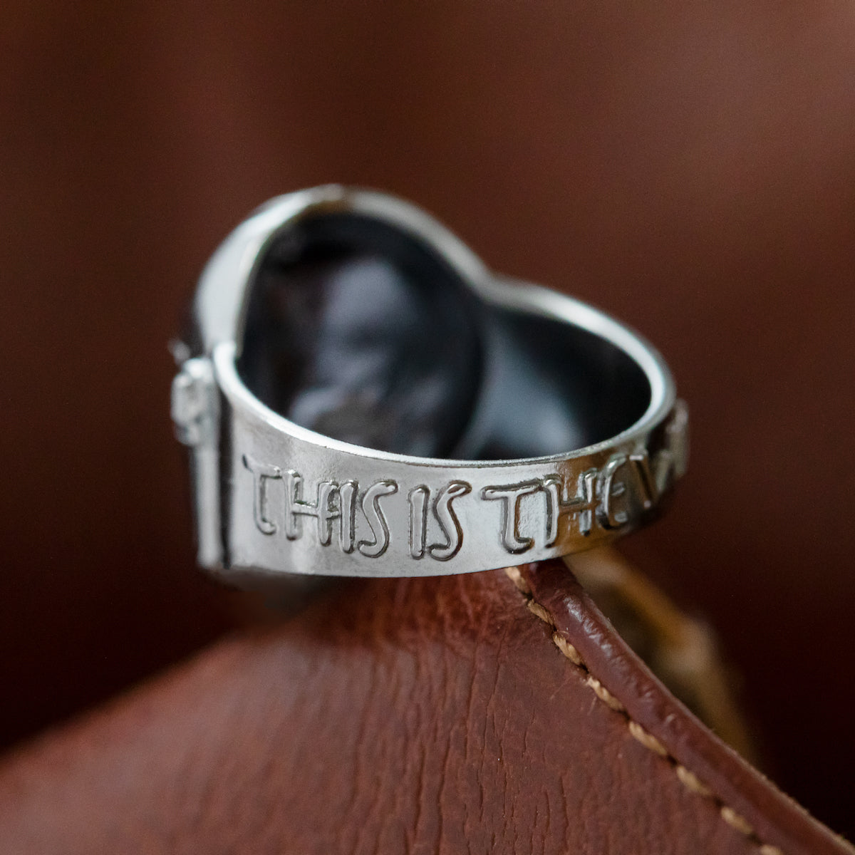 Comparison shot showing the scale of the 18mm tall Mandalorian helmet ring