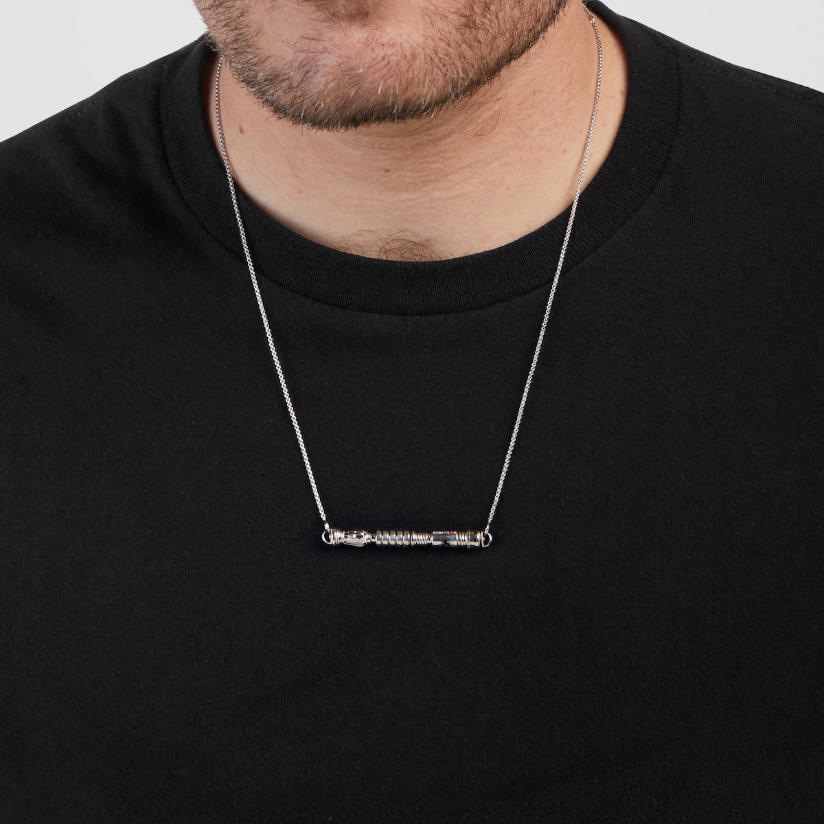 Star Wars RockLove Lightsaber Workshop necklace worn on a model, showcasing adjustable chain