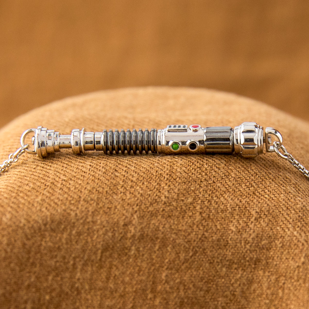 The lightsaber workshop modular components disassembled next to the chain.
