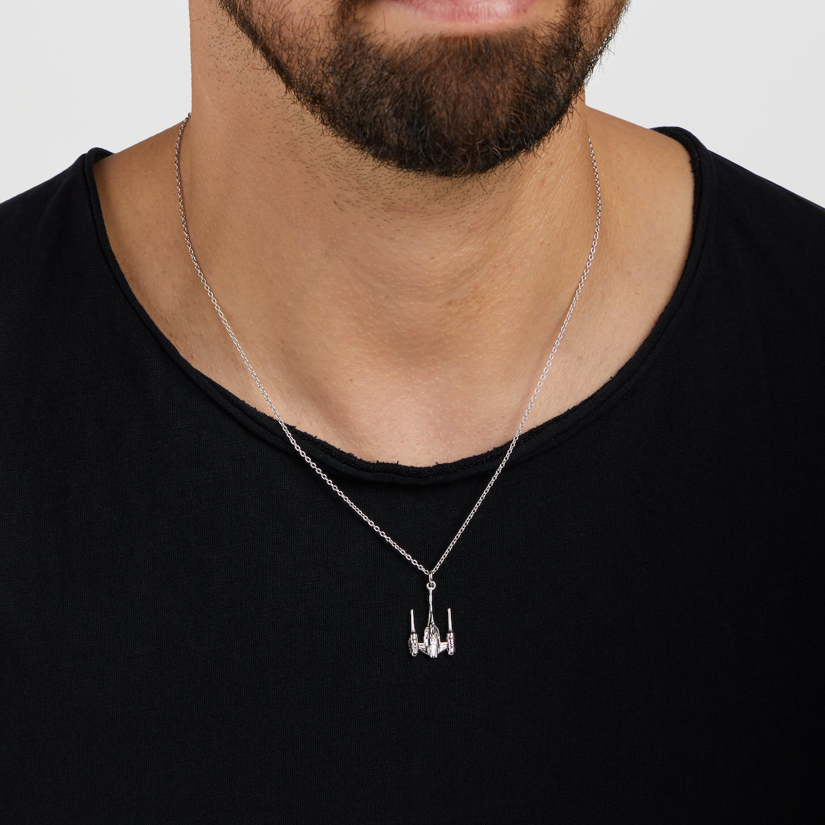 Antique finish detail on the sterling silver Star Wars starfighter pendant