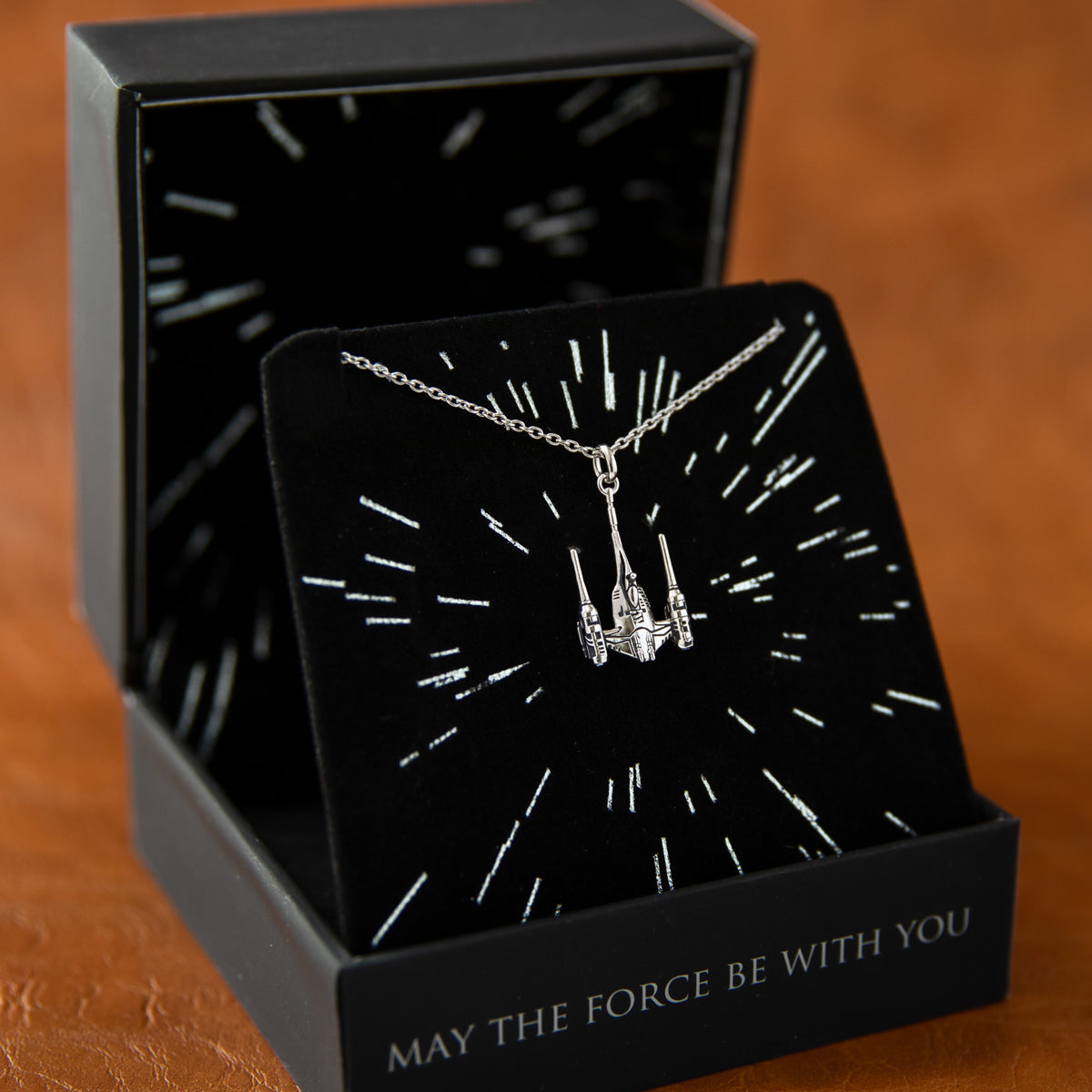 Star Wars x RockLove jewelry packaging and Naboo starfighter pendant set