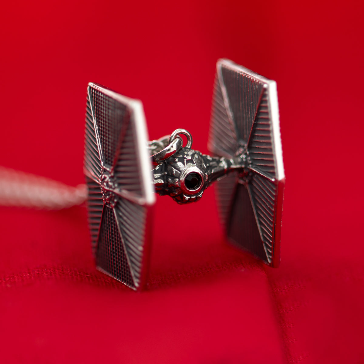 Side view of the detailed TIE Fighter wing panels in antiqued silver